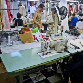 Garment workers assemble clothing