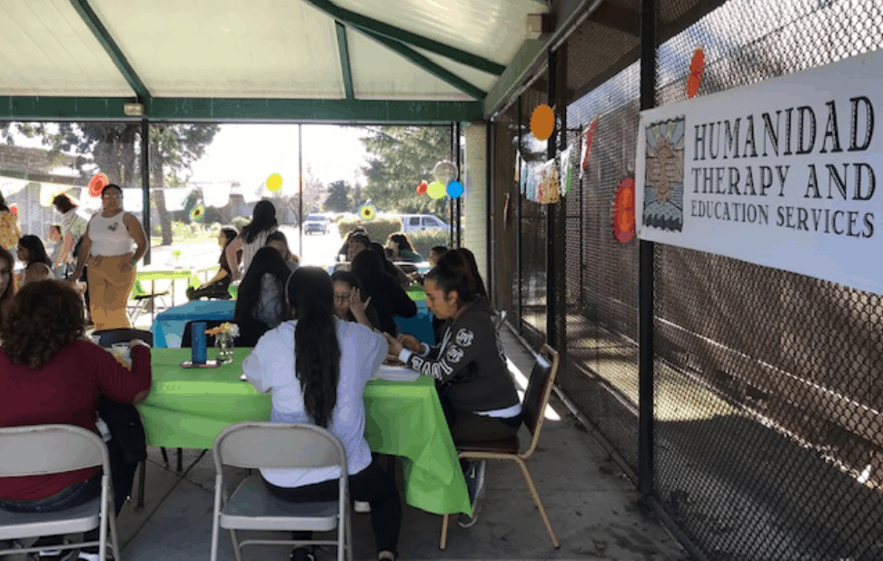 A community gathering to help Spanish-speaking residents process challenging events. 