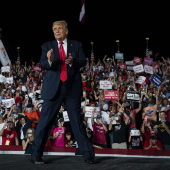 President Donald Trump walks off after speaking at a campaign rally in Florida on Oct. 12, 2020.