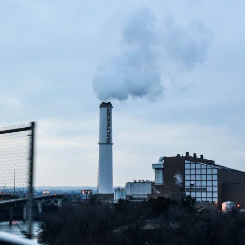  The smokestack of the Wheelabrator Incinerator is seen in Baltimore. Environmental justice is at a turning point. 