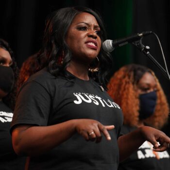 TULSA, OK - Dr. Tiffany Crutcher speaks during the Juneteenth celebration in the Greenwood District on June 19, 2020 in Tulsa, Oklahoma. Dr. Crutcher is the twin sister of Terence Crutcher who was killed by a Tulsa police officer in 2016. She is an advocate for police reform and racial justice. (Photo by Michael B. Thomas/Getty Images)
